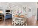Cozy dining area with hardwood floors and modern finishes that seamlessly connects to the adjacent living space at 10072 Fox Trotter Ln, Midland, NC 28107