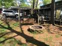 Relax in the backyard with fire pit, swing and shady spot for outdoor picnics at 108 Captains Ct # B116, Mount Gilead, NC 27306