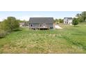 Expansive backyard with lush green grass perfect for outdoor activities and relaxation at 123 Pumice Dr, Statesville, NC 28625
