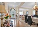 Grand foyer boasting hardwood floors, arched doorway, and ample natural light at 141 Ivy Creek Ln, Mooresville, NC 28115