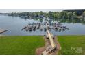 An aerial view of the lake, walking path, and boat slips at the condo community at 18700 Nautical Dr # 101, Cornelius, NC 28031