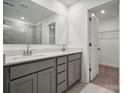 Bright bathroom with double sinks, modern finishes, and a large mirror at 290 Bezelle Ave, York, SC 29745