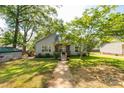 Charming single-story home featuring light blue siding, brick accents, mature landscaping, and a welcoming ramp at 441 Kimbrook Ct, Rock Hill, SC 29730