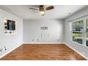 Bright living room showcases hardwood floors and neutral walls, offering a blank canvas for personalization at 1107 Stonehenge Ln, Charlotte, NC 28216