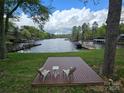 Stunning lake view from the backyard deck, perfect for relaxing and entertaining at 139 Sanford Ln, Badin Lake, NC 28127