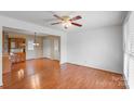 Bright and airy living room featuring hardwood floors, natural light and an adjacent dining area at 1504 Andicot Ln, Shelby, NC 28152