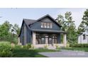 A front view showcasing a two-story home with a stone porch and complementary landscaping at 2557A Hemphill St, Charlotte, NC 28208