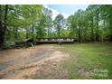 Expansive lot with a well-kept yard, perfect for outdoor activities at 2275 Brown Creek Church Rd, Wadesboro, NC 28170