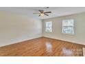 Bright and spacious living room featuring hardwood floors and ample natural light at 266 Kelly St, Statesville, NC 28677
