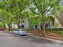 Beautiful condo community with attractive landscaping, available parking and blue/gray color scheme at 415 Mather Green Ave # I, Charlotte, NC 28203