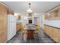 Spacious eat-in kitchen featuring ample cabinetry and countertops, ideal for Gathering meals and culinary activities at 4757 Mountain View Ln, Maiden, NC 28650