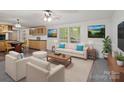 Bright living room featuring modern furniture, art, and ample natural light at 4757 Mountain View Ln, Maiden, NC 28650