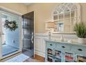 Welcoming foyer with a stylish entry table, mirror, and decor that set a warm tone at 4831 Looking Glass Trl, Denver, NC 28037