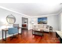 Inviting living room with hardwood floors and modern decor at 8807 Tree Haven Dr, Charlotte, NC 28270