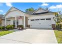Charming home with a two-car garage and a well-manicured lawn at 9077 Myrna Dr, Gastonia, NC 28056