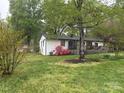 Residential backyard view with wooden deck at 212 E Stewart Ave, Mooresville, NC 28115