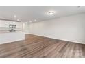 Spacious living room featuring sleek flooring and ample natural light at 221 Century Dr, Salisbury, NC 28147
