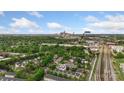 Aerial view of property's location near NODA with skyline and trees, offering convenient urban access at 534 Donatello Ave, Charlotte, NC 28205