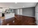 Modern kitchen with a breakfast bar, stainless steel appliances, and hardwood floors at 1005 Clarkson St, Rock Hill, SC 29730