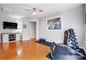 Home gym with hardwood floors, ample lighting, and exercise equipment at 13610 Aldenbrook Dr, Huntersville, NC 28078