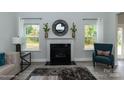Inviting living room featuring a fireplace and natural light at 1465 Mocksville Hwy # 20, Statesville, NC 28625
