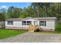 Charming single-story home with lush lawn and inviting entrance, perfect for comfortable living at 1649 Cloudburst Cir # 6, Lincolnton, NC 28092