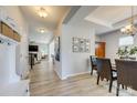 Bright entryway with hardwood floors, coat hooks, and views into the living and dining areas at 861 Watling St, Fort Mill, SC 29715