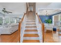 Inviting foyer featuring a staircase with wood treads and white risers leading to the upper level at 10354 Scotland Ave, Fort Mill, SC 29707