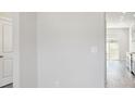 Hallway view with a door and light switch at 121 Vaquaro Dr, Mooresville, NC 28115