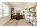 Bright home office featuring a large window, desk, and stylish decor at 127 Slip Shot Ln, Troutman, NC 28166