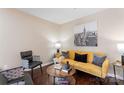 Cozy living room with modern decor, hardwood floors, and ample natural light at 1620#F Arlyn Cir, Charlotte, NC 28213