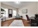 Cozy home office featuring hardwood floors and lots of natural light at 985 Angelica Ln, Tega Cay, SC 29708