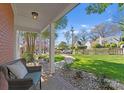 Charming front porch with seating and a view of the landscaped yard at 1751 Merriman Ave, Charlotte, NC 28203