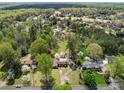 Expansive aerial view of a neighborhood with mature trees and well-maintained homes at 365 Pine Hill Rd, Salisbury, NC 28144
