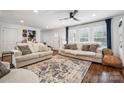Bright living room with plush sofas, large windows, and elegant decor, creating a welcoming atmosphere at 1327 Fairmont St, Charlotte, NC 28216