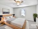 Comfortable main bedroom featuring a large bed, soft carpet, and neutral tones at 805 Gunnar Dr, Gastonia, NC 28054