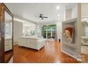 Bright living room with hardwood floors and large windows at 13505 Michael Lynn Rd, Charlotte, NC 28278