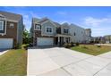 Lovely two-story home showcasing a well-maintained lawn and spacious driveway at 184 Tetcott St, Mooresville, NC 28115