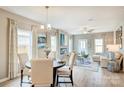 Open-concept living and dining area with hardwood floors at 2219 Catawba Trace Dr, Catawba, NC 28609