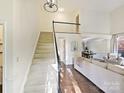 Open floor plan showcases a staircase, and great natural light at 3017 Planters Walk Ct, Charlotte, NC 28210