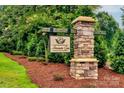 Stone monument sign at the entrance to Alexander Glen neighborhood at 320 Silver Oak Cir, Rockwell, NC 28138