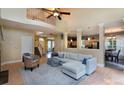Inviting living room with high ceilings, natural light, and an open layout to the kitchen and dining area at 3404 Pasture View Ct, Charlotte, NC 28269