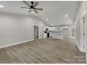 Spacious living room features an open layout with sleek flooring and natural light, perfect for entertaining at 1212 Belmont Circle Dr, Lancaster, SC 29720