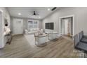Inviting living room with stylish decor, modern furnishings, and lots of natural light at 1212 Belmont Circle Dr, Lancaster, SC 29720