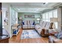 Cozy living room with hardwood floors, comfortable seating, and abundant natural light at 212 Brookwood Dr, Salisbury, NC 28146