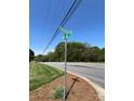 Street sign for Yadkin St. and Ridge Rd. at a well-maintained property and street at 901 Ridge St, Albemarle, NC 28001