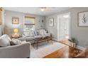 Cozy living room with hardwood floors, neutral decor, and plenty of natural light at 912 W A St, Kannapolis, NC 28081