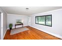 Bright living room featuring hardwood floors and large windows at 134 Piedmont Dr, Kannapolis, NC 28081