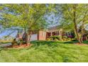 Beautiful single Gathering home with mature trees and a well-manicured front lawn at 138 Victoria Park Dr # 170, Shelby, NC 28150