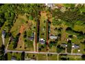 Aerial view of property showing the home on a spacious lot surrounded by trees at 186 Ellendale Ln, Taylorsville, NC 28681